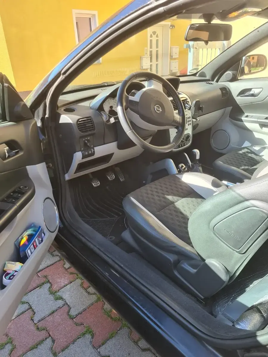 Gebraucht Opel Tigra 90 PS (66 kW) 2009 Schwarz Cabrio