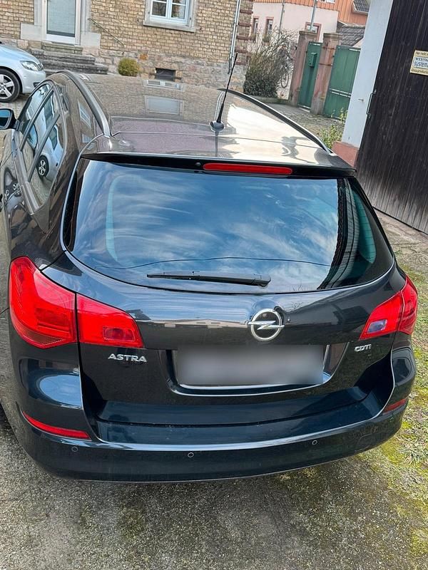 Gebraucht Opel Astra 110 PS (80 kW) 2012 Schwarz Kombi