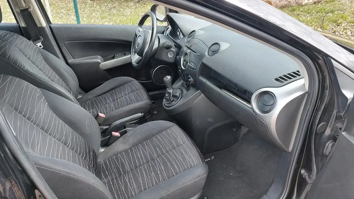 Gebraucht Mazda 2 75 PS (55 kW) 2009 Schwarz Kleinwagen