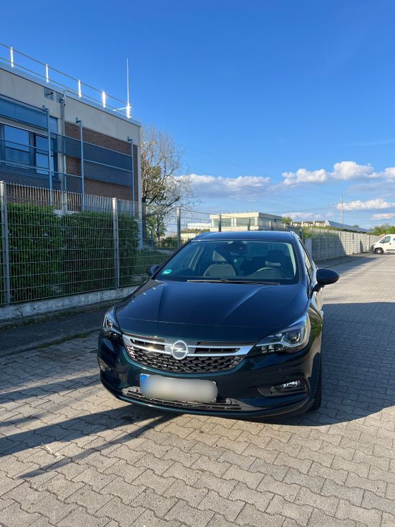Grün Gebraucht 2017 Opel Astra Innovation Kombi | 8.300 € (Guter Preis) - Bild 1/4