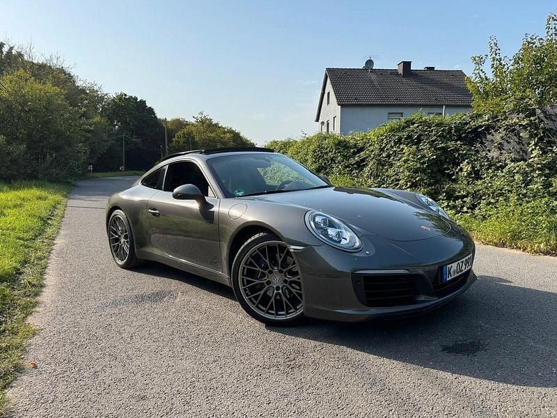 Grau Gebraucht 2018 Porsche 911 Carrera Coupé | 95.000 € (Superpreis) - Bild 1/4