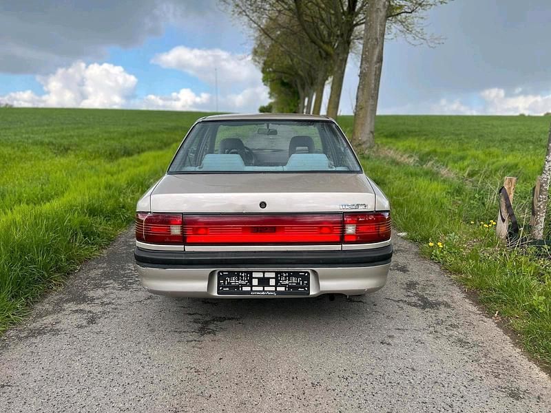 Gebraucht Mazda 323 88 PS (64 kW) 1992 Gold Limousine
