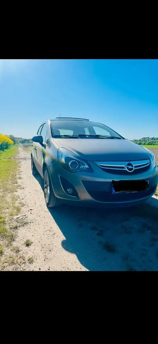 Gebraucht Opel Corsa 101 PS (74 kW) 2014 Gold Kleinwagen