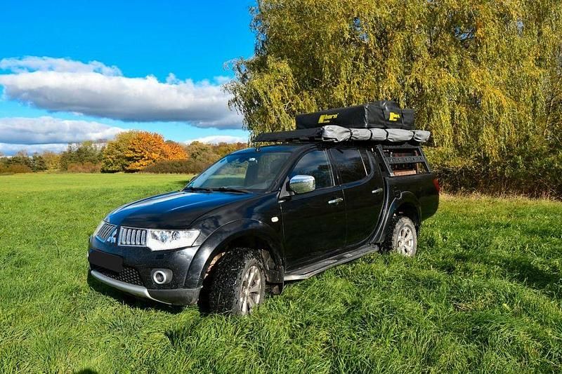 Schwarz Gebraucht 2011 Mitsubishi L200 Intense+ Abholung | 12.650 € (Fairer Preis) - Bild 1/4