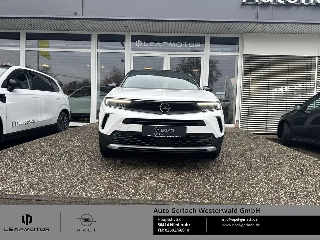 Gebraucht Opel Mokka-e Ultimate 100 kW (136 PS) 2024 Jade weiss/arktis weiss SUV