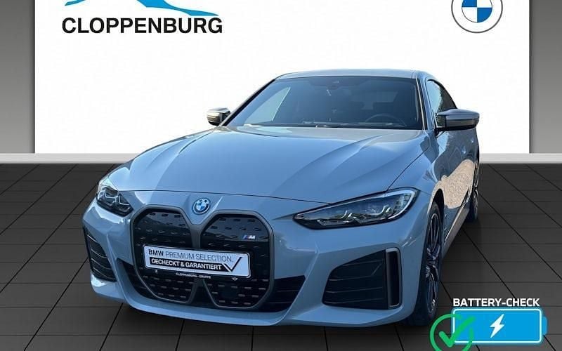 Grau Gebraucht 2022 BMW i4 Limousine | 43.555 € (Guter Preis) - Bild 1/4
