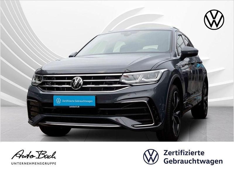 Grau (delfingrau metallic) Gebraucht 2021 VW Tiguan R-line SUV | 36.940 € (Fairer Preis) - Bild 1/4