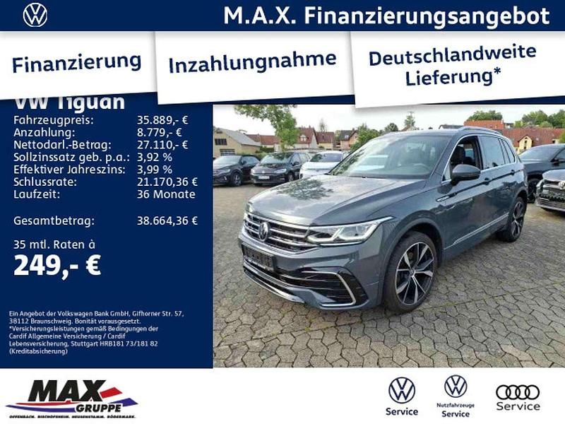Delfingrau metallic Gebraucht 2021 VW Tiguan R-line SUV | 35.889 € (Fairer Preis) - Bild 1/3