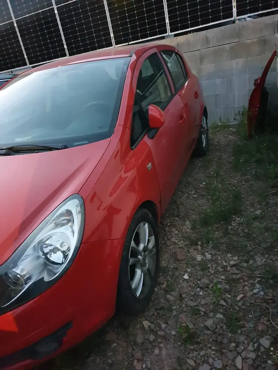 Gebraucht Opel Corsa 69 PS (50 kW) 2008 Rot Kleinwagen