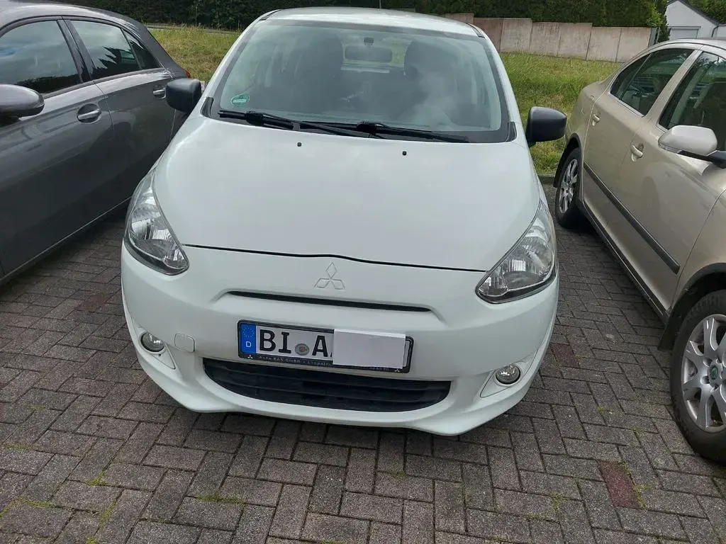 Gebraucht Mitsubishi Space Star 71 PS (52 kW) 2014 Weiß Van / Kleinbus