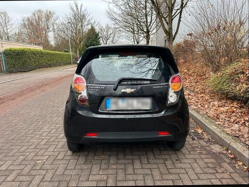 Gebraucht Chevrolet Spark 68 PS (50 kW) 2013 Schwarz Kleinwagen