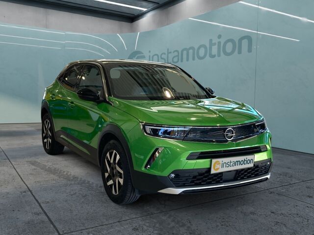Grün Gebraucht 2022 Opel Mokka-e Elegance SUV | 17.390 € (Guter Preis) - Bild 1/2
