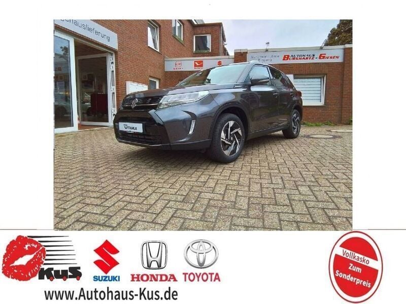 Grau Gebraucht 2024 Suzuki Vitara Comfort+ SUV | 26.880 € (Teuer) - Bild 1/4