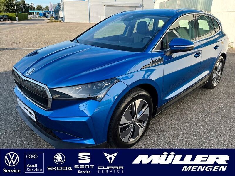 Raceblau metallic met. Gebraucht 2021 Skoda Enyaq iV Loft SUV | 31.590 € (Fairer Preis) - Bild 1/4