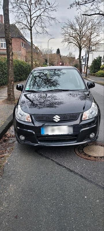 Schwarz Gebraucht 2011 Suzuki SX4 City Limousine | 4.900 € (Fairer Preis) - Bild 1/4
