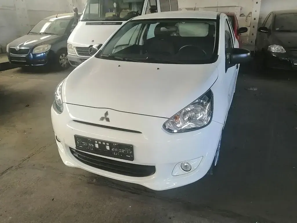 Gebraucht Mitsubishi Space Star 71 PS (52 kW) 2015 Weiß Limousine