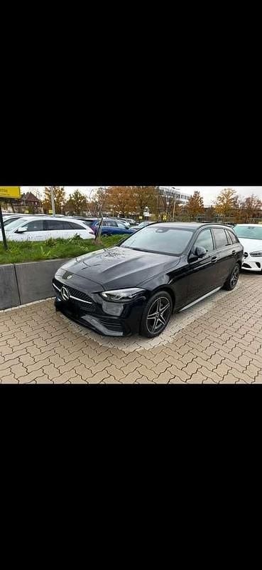 Schwarz Gebraucht 2023 Mercedes C300e AMG line Kombi | 37.500 € (Superpreis) - Bild 1/4