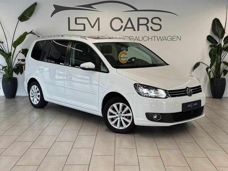 Weiß Gebraucht 2014 VW Touran Highline Van / Kleinbus | 9.490 € (Fairer Preis) - Bild 1/4