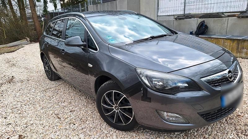 Gebraucht Opel Astra 125 PS (91 kW) 2011 Grau Kombi