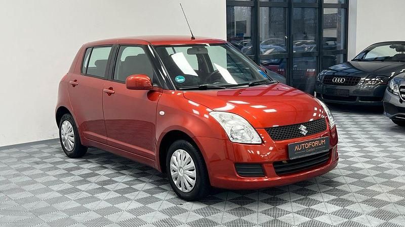 Orange Gebraucht 2010 Suzuki Swift Club Limousine | 4.399 € (Etwas zu teuer) - Bild 1/4