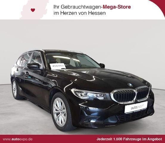 Schwarz Gebraucht 2021 BMW 330e Advantage Kombi | 21.789 € (Fairer Preis) - Bild 1/4