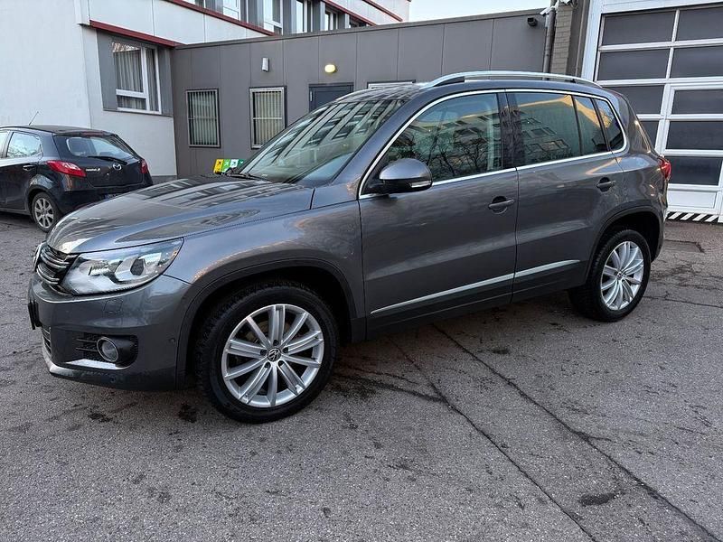 Pepper grey Gebraucht 2014 VW Tiguan Sportline SUV | 15.290 € (Fairer Preis) - Bild 1/4
