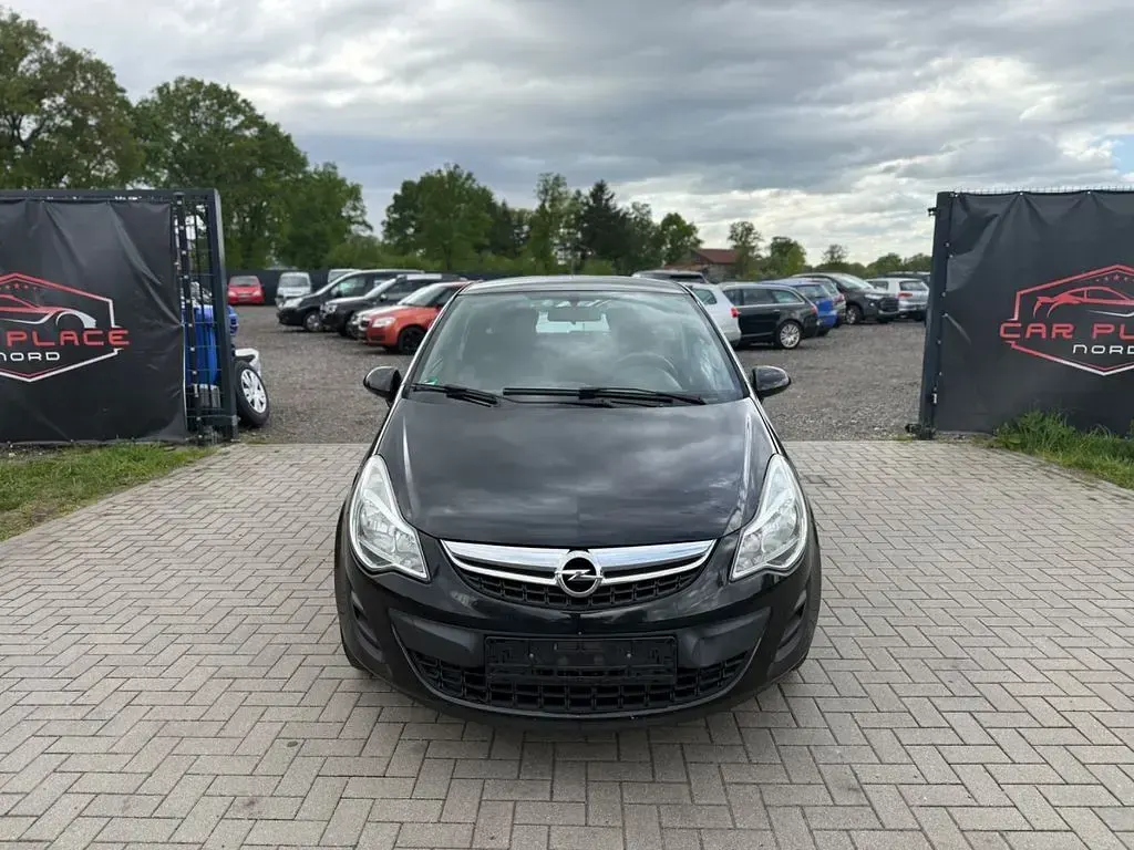 Gebraucht Opel Corsa Active 69 PS (50 kW) 2013 Schwarz Kleinwagen