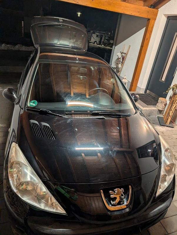 Gebraucht Peugeot 206 60 PS (44 kW) 2011 Schwarz Limousine