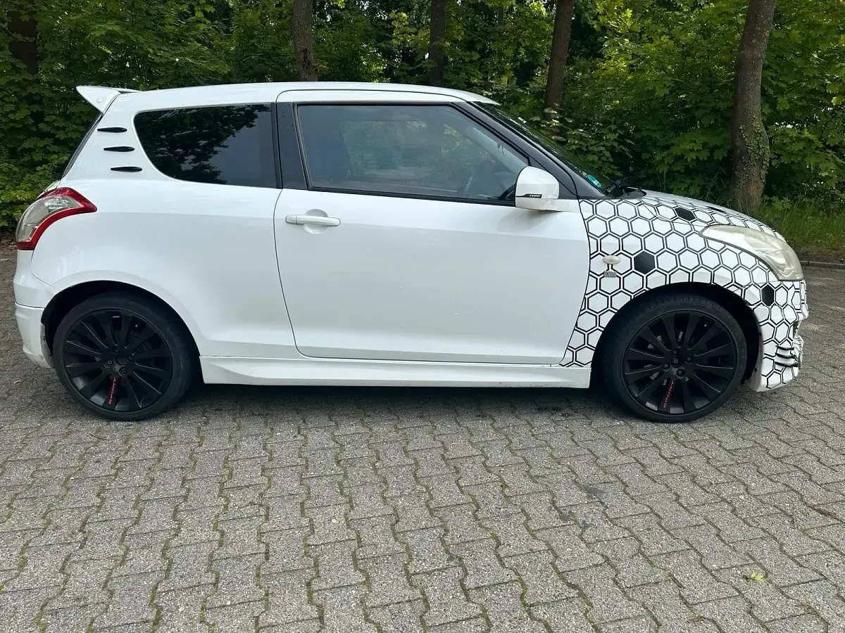 Gebraucht Suzuki Swift 94 PS (69 kW) 2012 Weiß Kleinwagen