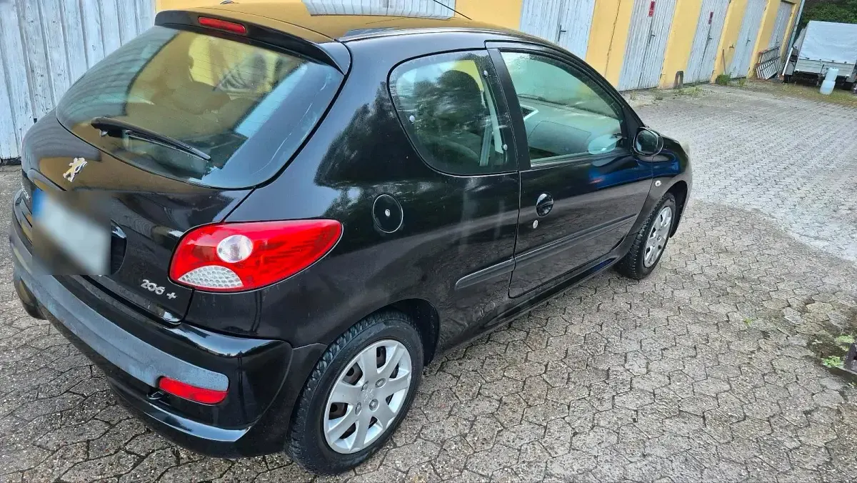 Gebraucht Peugeot 206 60 PS (44 kW) 2009 Schwarz Kleinwagen