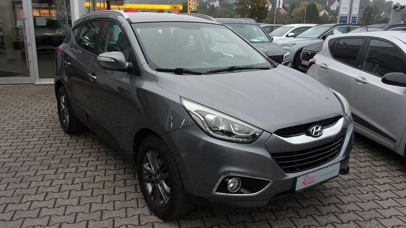 Grau Gebraucht 2014 Hyundai ix35 Edition SUV | 10.950 € - Bild 1/4