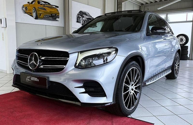 Silber Gebraucht 2016 Mercedes GLC250 AMG line SUV | 19.990 € (Fairer Preis) - Bild 1/4