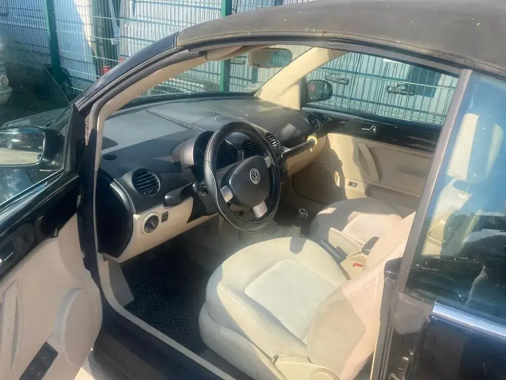 Gebraucht VW New Beetle 116 PS (85 kW) 2005 Schwarz Kleinwagen