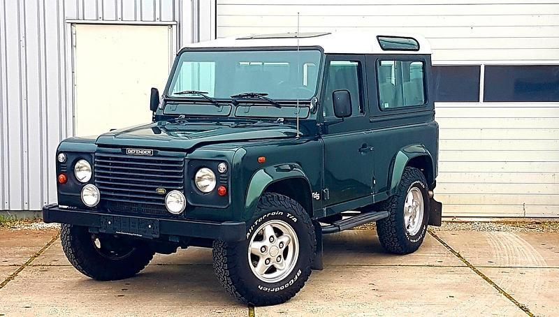 Grün Gebraucht 1999 Land Rover Defender SUV | 16.999 € - Bild 1/4