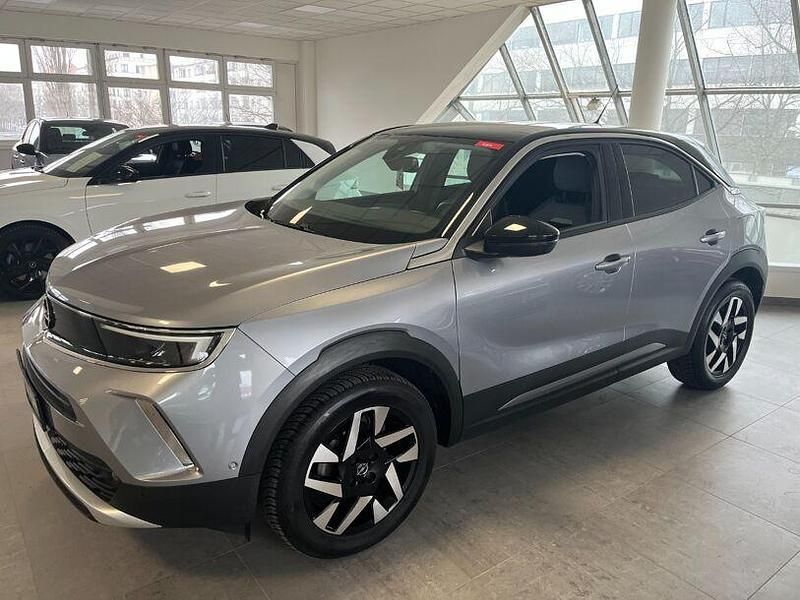 Gebraucht Opel Mokka Elegance 101 PS (74 kW) 2022 Kontrast grau/quarz silber (metallic) SUV