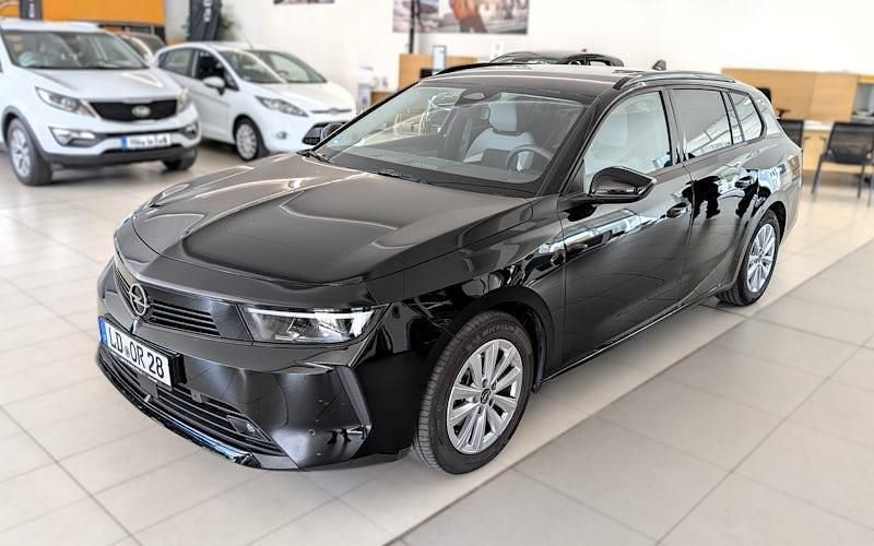 Karbon schwarz Gebraucht 2024 Opel Astra Enjoy Kombi | 23.850 € (Fairer Preis) - Bild 1/4