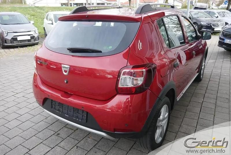 Gebraucht Dacia Sandero Prestige 90 PS (66 kW) 2015 Flammenrot metallic Kleinwagen