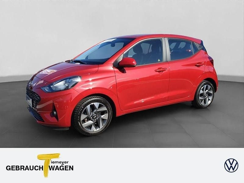 Dragon red / met Gebraucht 2024 Hyundai i10 Trend Kleinwagen | 14.940 € (Guter Preis) - Bild 1/4