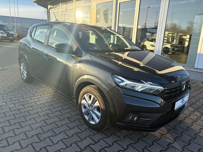 Grau "comete" Gebraucht 2021 Dacia Sandero Comfort Kleinwagen | 10.790 € (Fairer Preis) - Bild 1/4