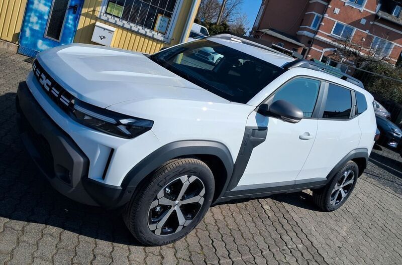 369 polarweiß Neu 2025 Dacia Duster Journey SUV | 25.480 € (Superpreis) - Bild 1/4