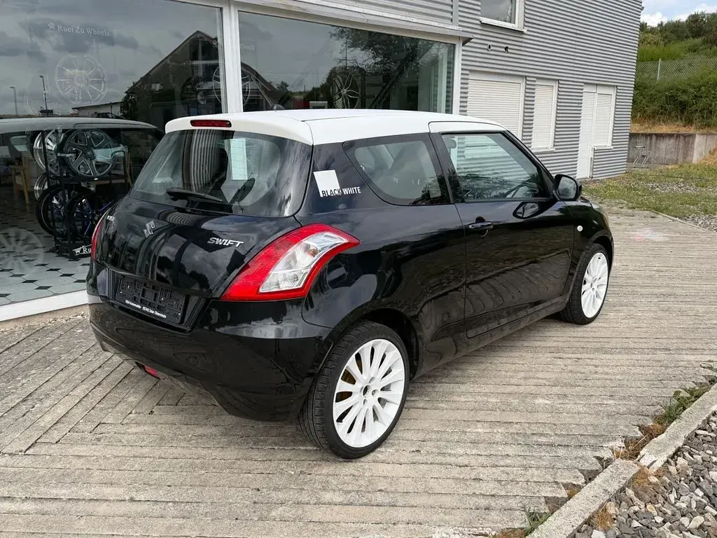 Gebraucht Suzuki Swift Basic 94 PS (69 kW) 2013 Schwarz Kleinwagen