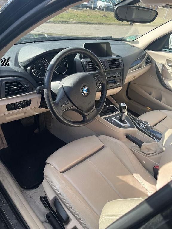 Używany BMW 116 136 KM (100 kW) 2011 Czarny Hatchback