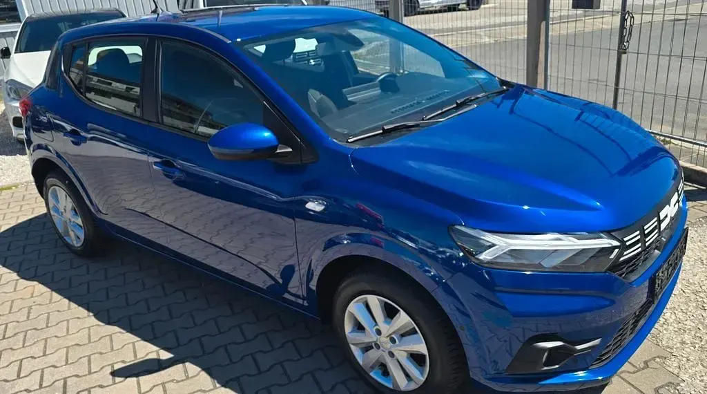 Gebraucht Dacia Sandero Expression 91 PS (66 kW) 2024 Blau Limousine
