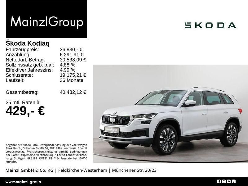 Moonweiß perleffekt/moonweiss metallic (metallic) Gebraucht 2022 Skoda Kodiaq Tour SUV | 36.830 € (Fairer Preis) - Bild 1/3