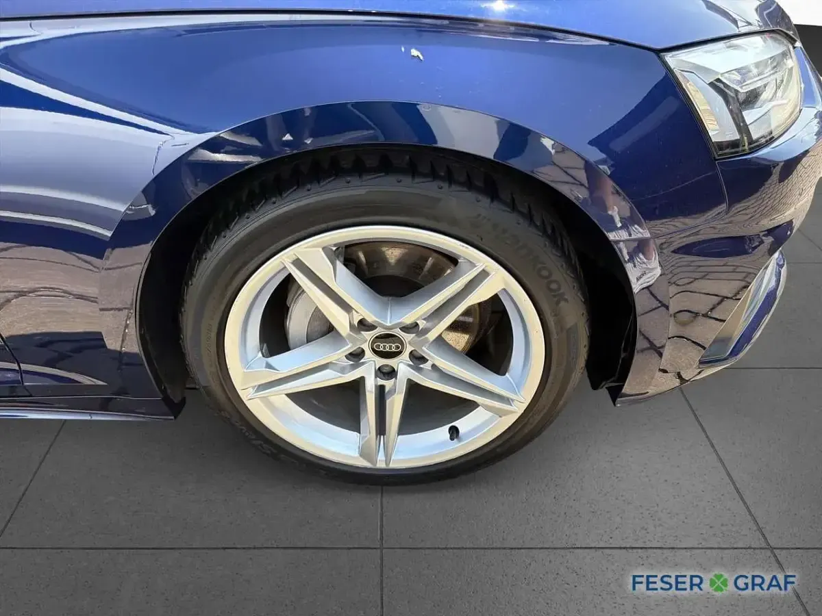 Gebraucht Audi A5 Cabriolet Basis 204 PS (150 kW) 2023 Navarrablau metallic/verdec... Cabrio