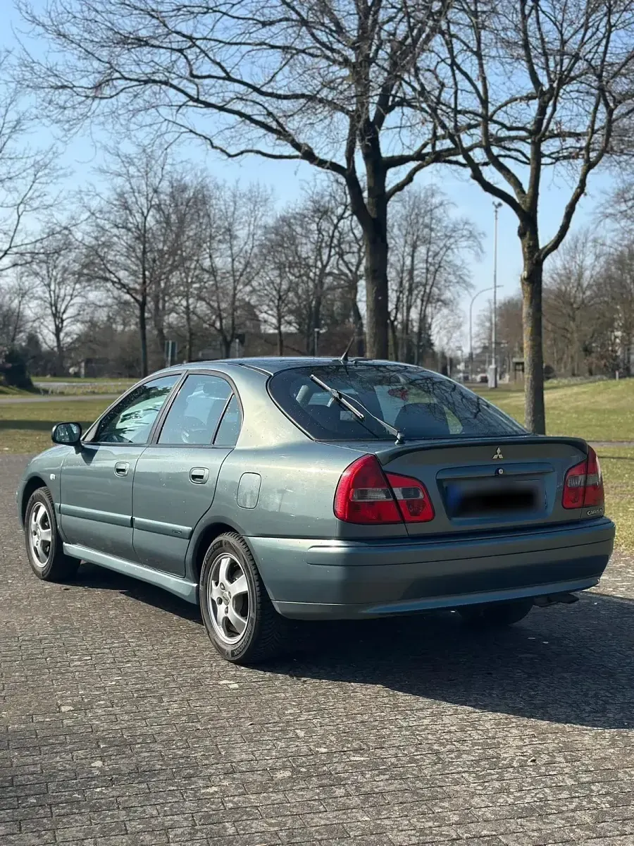 Gebraucht Mitsubishi Carisma 103 PS (75 kW) 2003 Grün Limousine