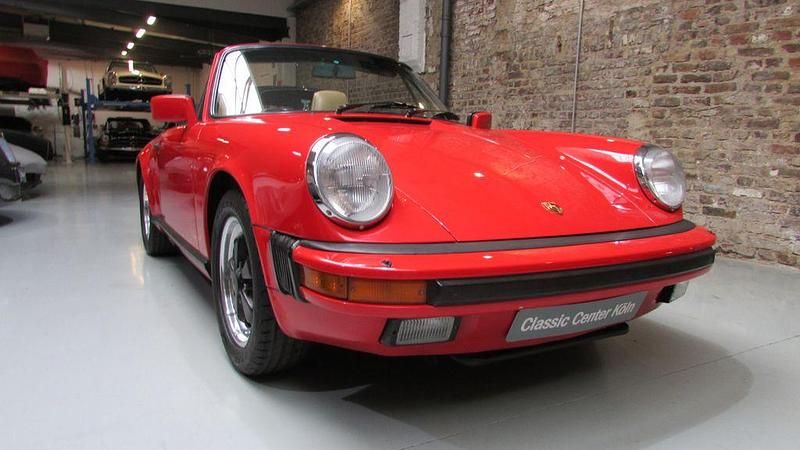 Rot Gebraucht 1986 Porsche 911 Carrera Cabriolet Cabrio | 64.911 € - Bild 1/4
