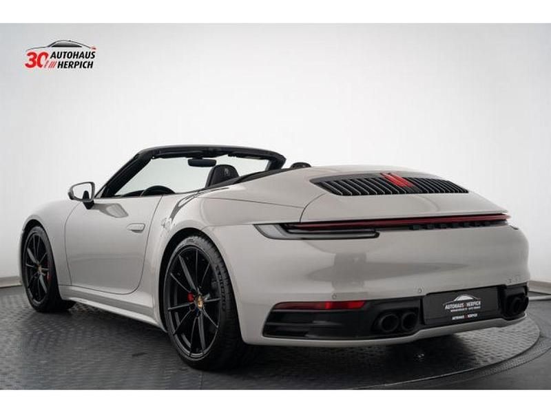 Gebraucht Porsche 992 450 PS (330 kW) 2024 Kreide Cabrio