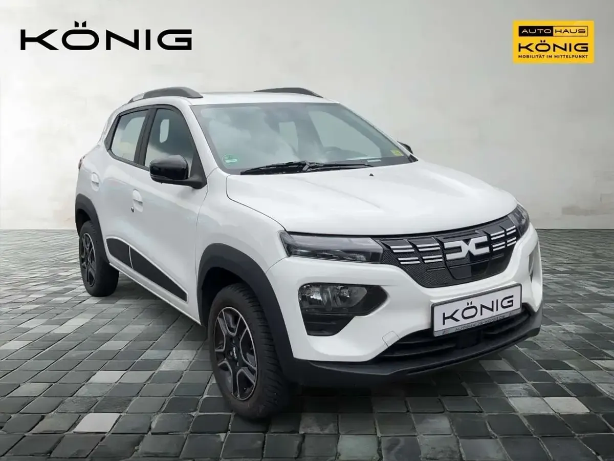 Gebraucht Dacia Spring Essentiel 19 kW (26 PS) 2023 Kaolinweiß Kleinwagen