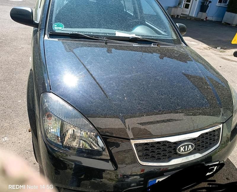 Second-hand Kia Rio 75 CP (55 kW) 2010 Negru Hatchback